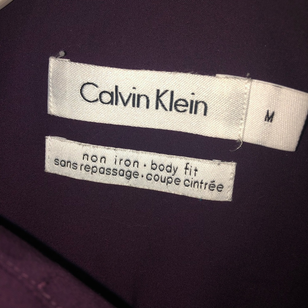 Purple Calvin Klein button up dress shirt